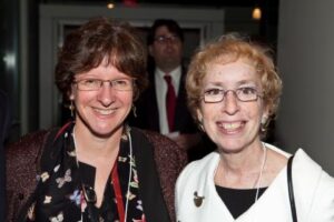 Phyllis Kaniss (right) with Academy board member Julia Adams.