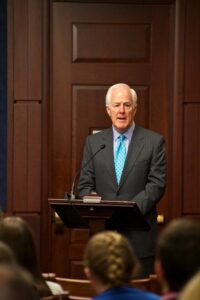 Senator John Cornyn (T-RX) welcomes audience to criminal justice reform briefing.