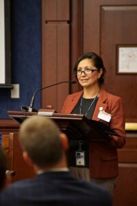 NIJ Director Nancy Rodriguez addresses the audience